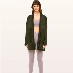 Lululemon “Sit inLotus Wrap II” in dark olive, size 4.